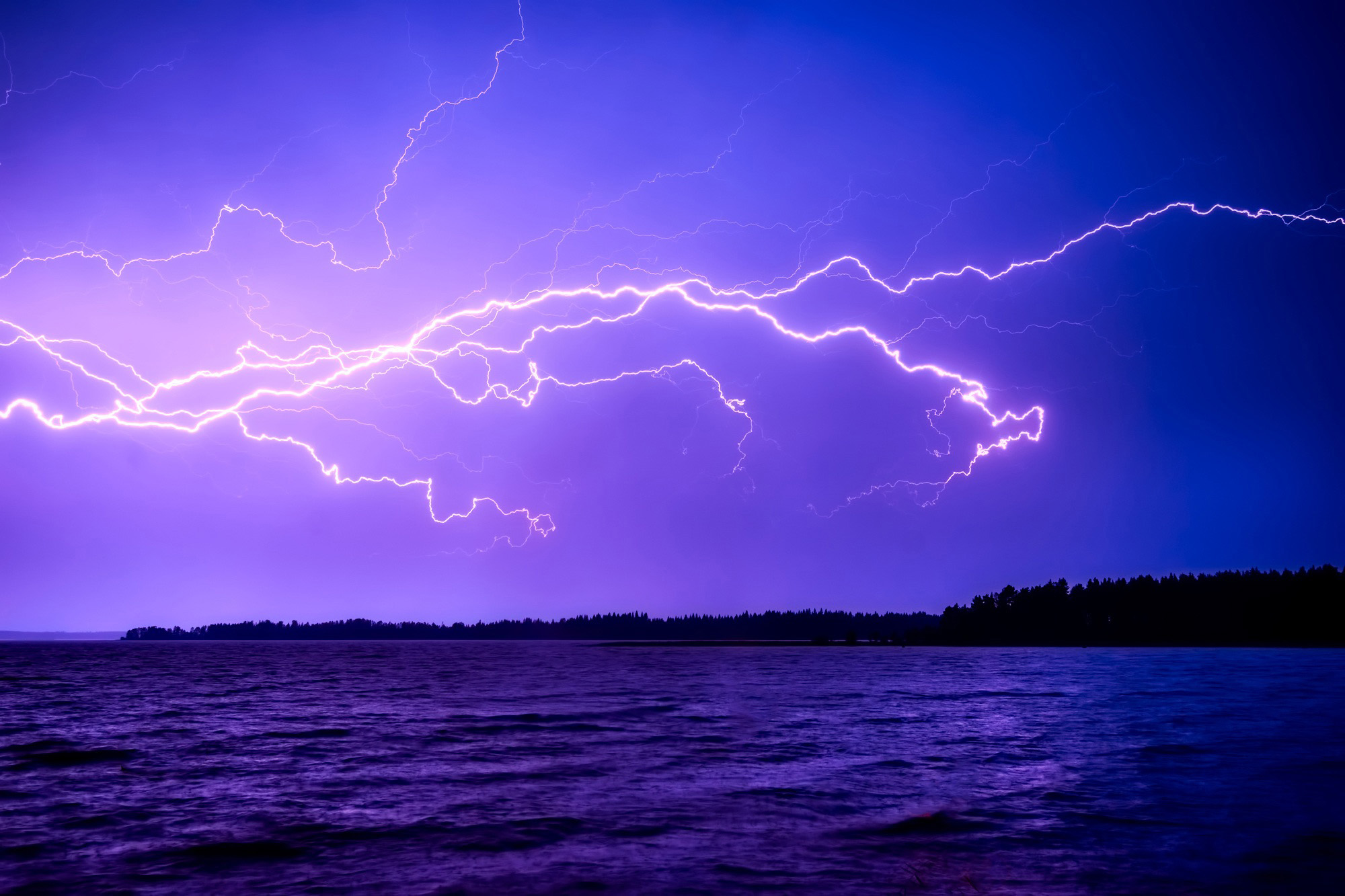 Sideways purple lightning via GoodFreePhotos.com
